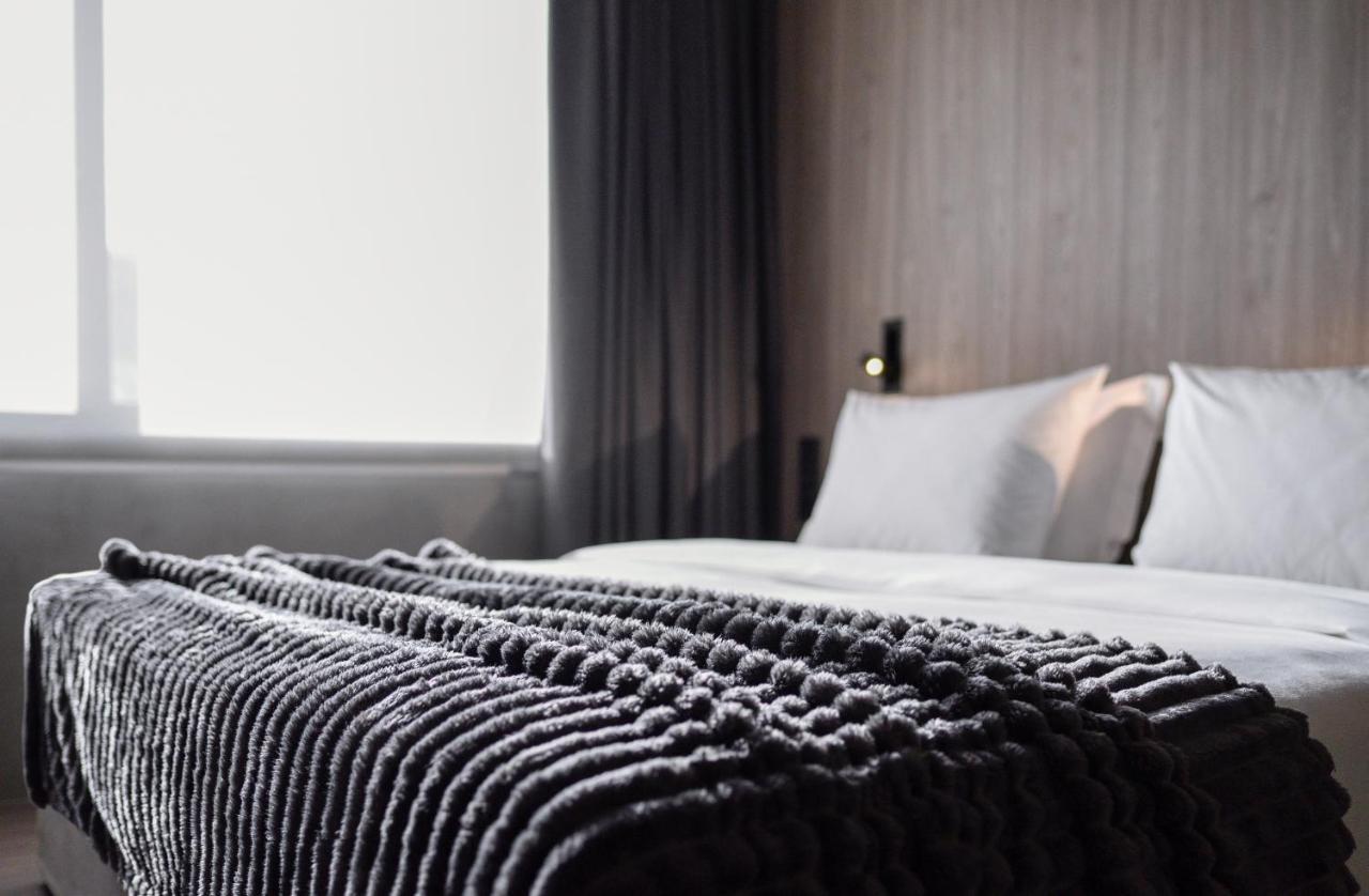 Onoma Hotel 塞萨洛尼基 外观 照片 A bed with a throw