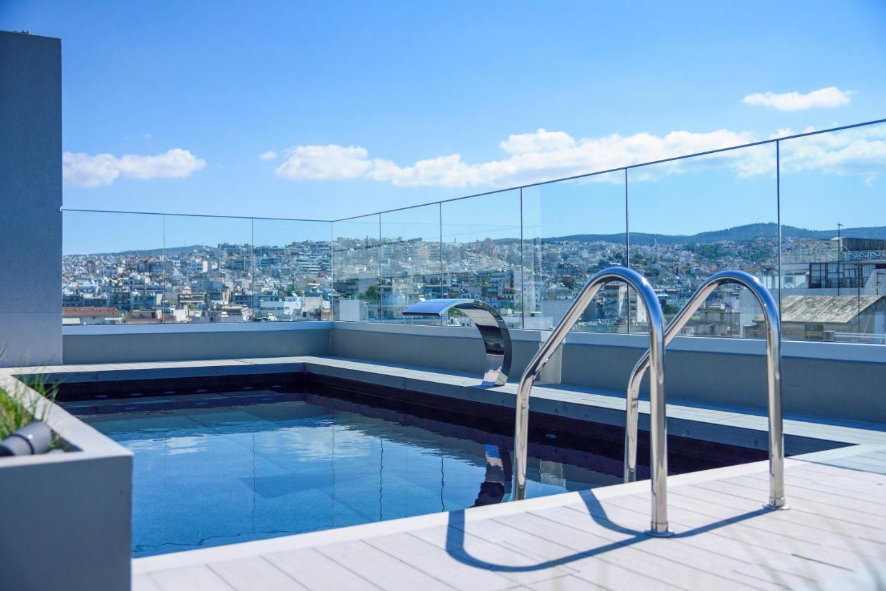 Onoma Hotel 塞萨洛尼基 外观 照片 A pool with a glass balustrade